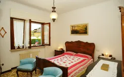 Bild 14: 1. Schlafzimmer mit Doppelbett
