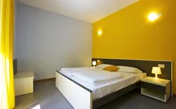 Bild 12: 1. Schlafzimmer mit 2 Einzelbetten, die man nebeneinander stellen kann