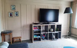 Bild 14: Wohnzimmer mit Auszugssofa/Ecksofa und TV